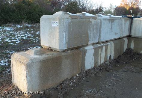 (20) concrete locking blocks in O'Fallon, MO | Item DE4997 sold | Purple Wave