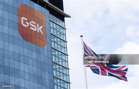 The GSK Plc logo on the exterior of the headquarters of the company ...