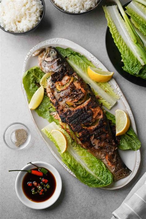 Grilled Whole Fish Recipe (Charcoal or Gas Grill) - Hungry Huy | Recipe | Whole fish recipes ...