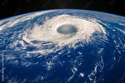 Hurricane eye on Earth viewed from space. Satellite view. Elements of this image furnished by ...