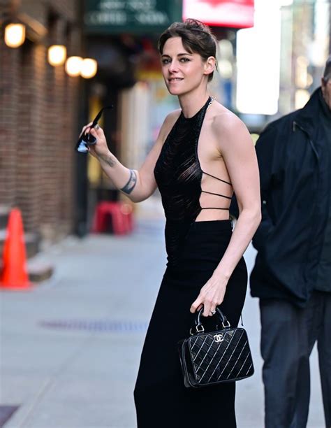 Kristen Stewart goes braless in semi-sheer top and stockings for racy new appearance | HELLO!