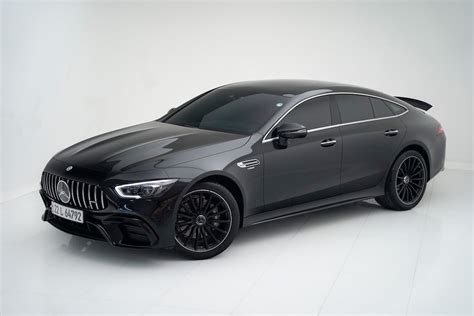 The mercedes amg gt coupe in black · Free Stock Photo