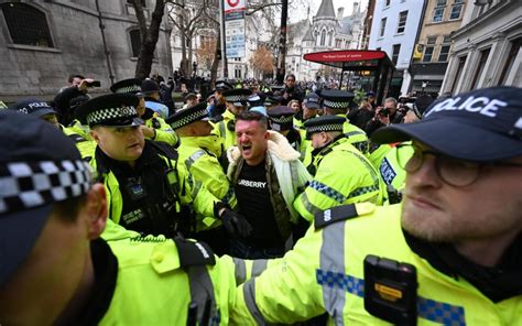 Watch: Tommy Robinson arrested at anti-Semitism march