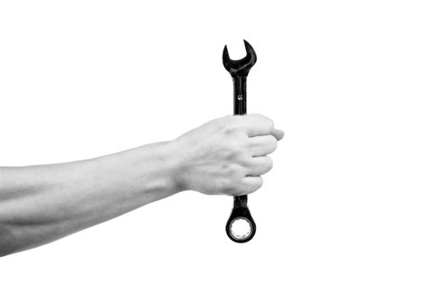 Premium Photo | Wrench repair tool in hand isolated on white repairing