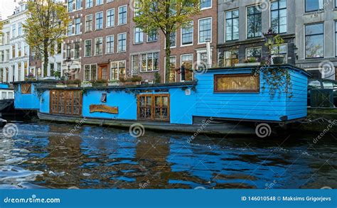 Traditional Floating Boat House in Amsterdam Canals, the Netherlands ...