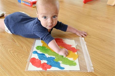 Tummy Time Painting - Mama.Papa.Bubba. | Baby sensory play, Infant ...