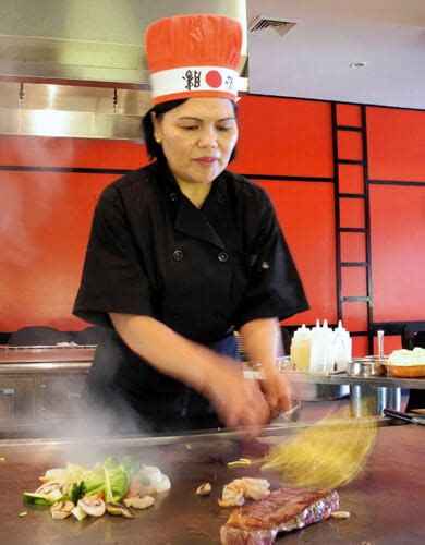 Lady chef manning hibachi grill at City Island’s Ohana – Bronx Times