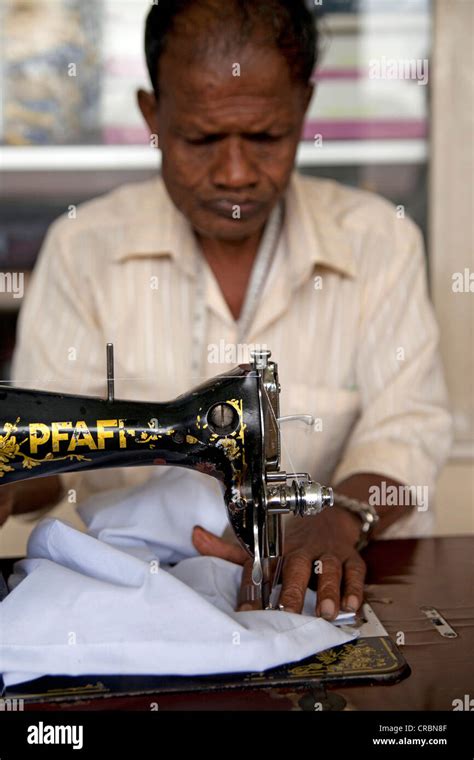 Dressmaker working with an old Pfaff sewing machine, Kandy, Sri Lanka, Indian Ocean Stock Photo ...