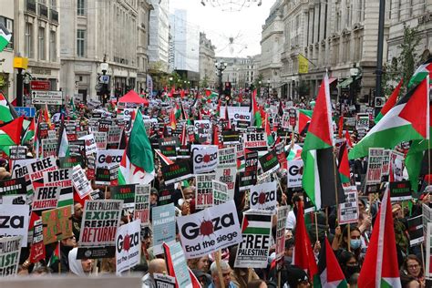 Pro-Palestine march draws thousands in London as Met police warn Hamas supporters face arrest