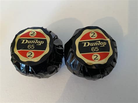 I found some old Dunlop golf balls, individually wrapped! : r/golf