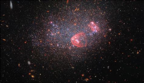 NASA Observatory captures cosmic 'Christmas tree cluster' - World News