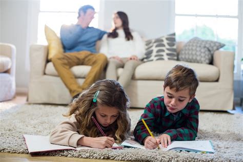 Premium Photo | Children doing homework with parents