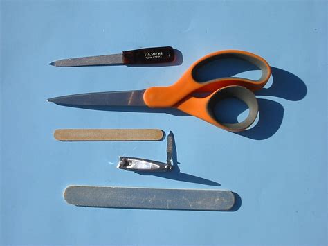 More than enough tools... | Just the nail clippers will cut … | Flickr