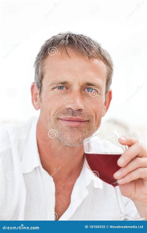 Handsome Man Drinking Some Red Wine Stock Photo - Image: 18106920