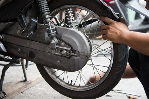 Motorcycle tire repair stock image. Image of service - 25040329