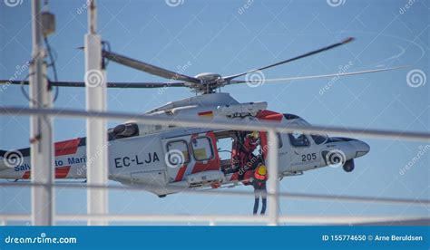 Rescue Helicopter Loading Passenger from Cruise Ship Editorial Image - Image of patient, coast ...