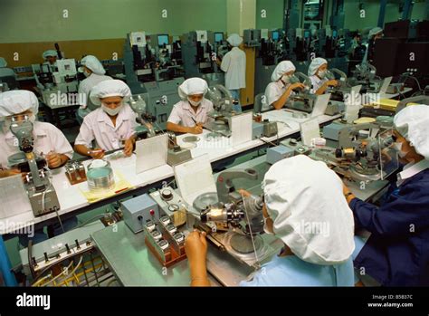 Women working on a production line in the computer industry in Bangkok ...