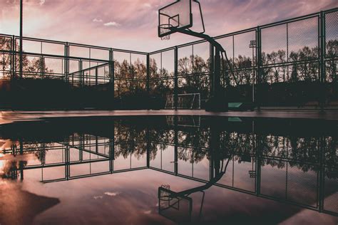 Basketball Hoop Reflecting on Water · Free Stock Photo