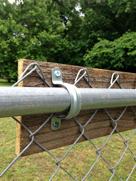 Upgrading a chain link fence | Backyard fences, Privacy fence designs, Diy garden fence