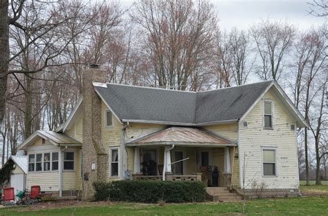 white and brown house near bare trees during daytime photo – Free Grey ...