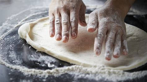 You Should Never Use A Rolling Pin For Pizza Dough. Here's Why