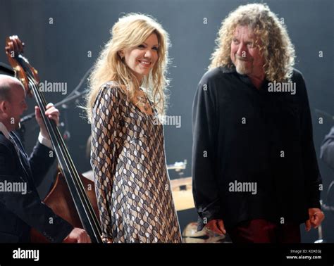 Alison Krauss and Robert Plant are shown performing onstage at the Stock Photo: 163466034 - Alamy