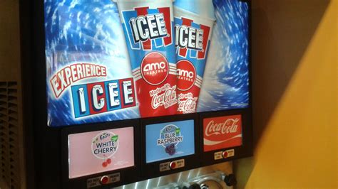 AMC Theaters ICEE dispenser. Pick from 3 flavors - White Cherry, Blue Raspberry, and Coke ...