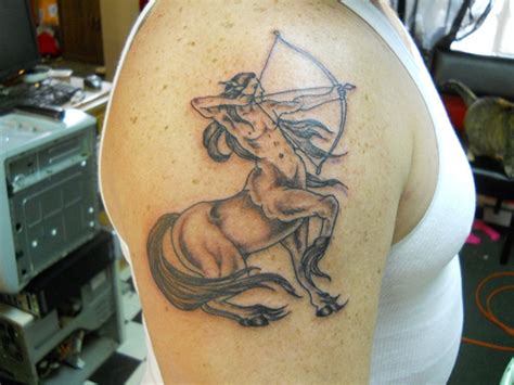 14 Stunning Sagittarius Tribal Tattoos