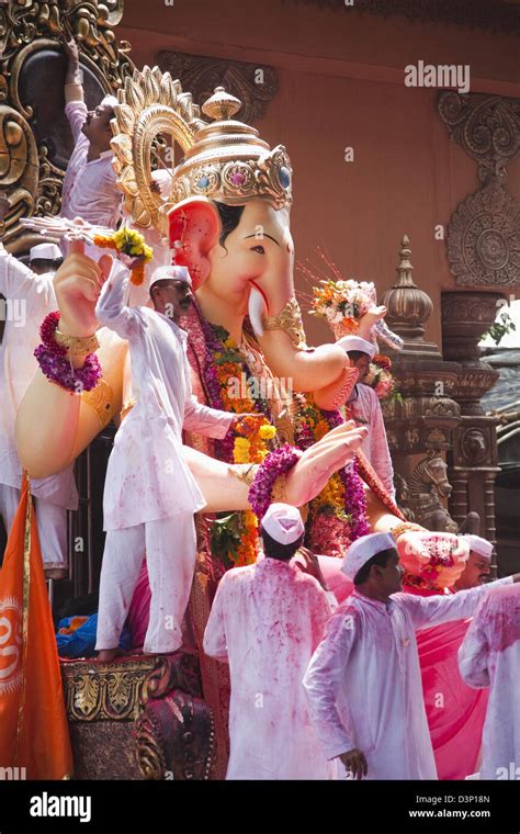 People at religious procession during Ganpati visarjan ceremony, Mumbai, Maharashtra, India ...