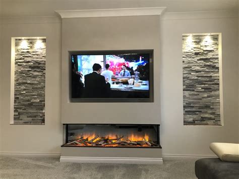 Media wall and fire | Feature wall living room, Living room decor fireplace, Home fireplace