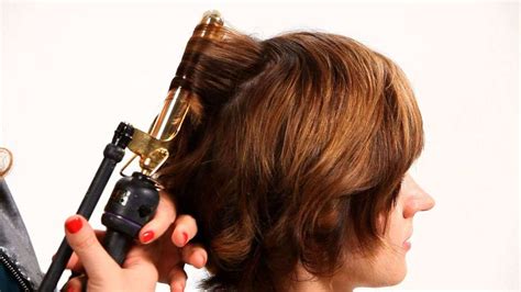 How to Use a Curling Iron on Short Hair, Part 1 - Howcast