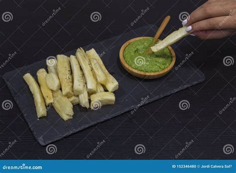 Fried Yucca with Sauce Guasacaca, Venezuelan Dish Stock Photo - Image ...