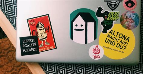 Macbook Pro With Different Stickers · Free Stock Photo