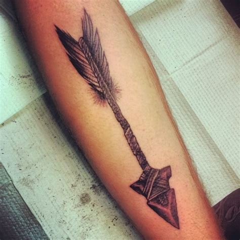 Ancient tribal arrow tattoo design - Tattooimages.biz