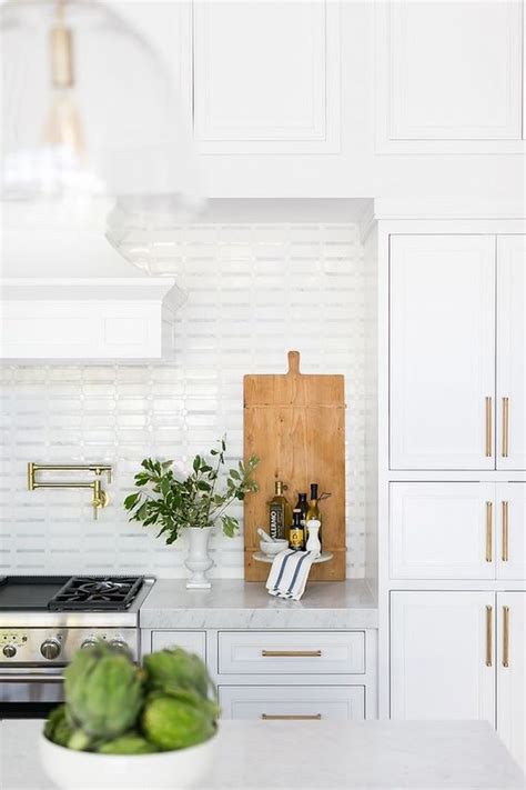 Quick Guide: 5 Beautiful Backsplash Tiles for White KitchensBECKI OWENS