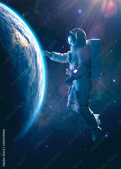 Astronaut in outer space touching the thin atmosphere of the earth - 3D ...