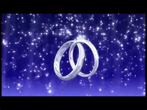 Two Silver Wedding Rings Rotating beautiful bright stars on the background - YouTube