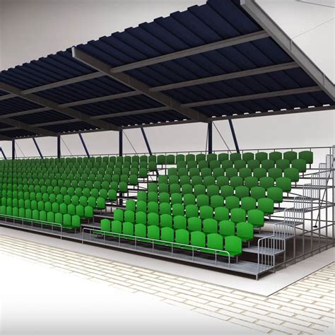 an empty stadium filled with green seats under a metal roof over ...