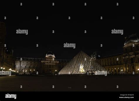 Louvre pyramid by night Stock Photo - Alamy