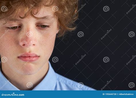 Close-up Portrait of Sad Caucasian Boy Looking Down Stock Photo - Image ...