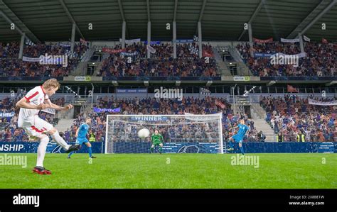 Football Championship: White Team Forward Hits the Ball and Scores ...