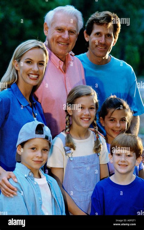 Portrait of a family smiling Stock Photo - Alamy