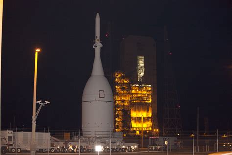 NASA’s Pathfinding Orion Rolls to Launch Pad, Hoisted atop Rocket for ...