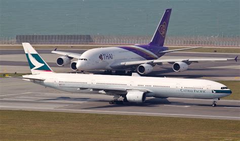 Cathay Pacific Boeing 777-300 and Thai Airways Airbus A380-800 ...