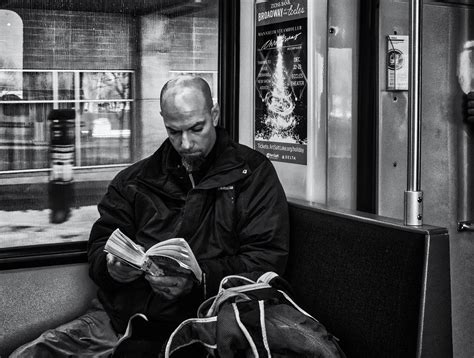 Train Reading – Photography by CyberShutterbug