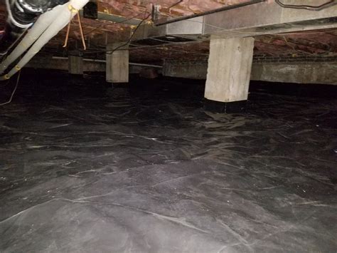 Standard Black Vapor Barrier with batting insulation in above floor joist - Affordable Radon