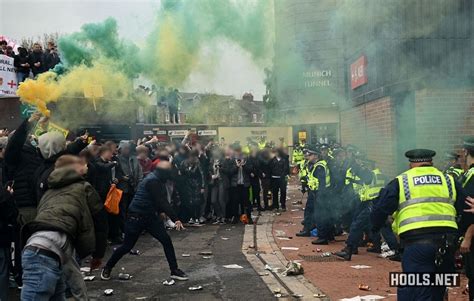 Man Utd fans storm Old Trafford pitch in anti-Glazer protest before ...