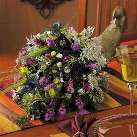 Cornucopia centerpiece | Fall floral arrangements, Cornucopia centerpiece, Holiday arrangement