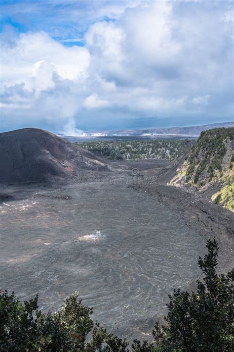 Kilauea Caldera in Volcanoes National Park, Hawaii Stock Photo - Image of vegetation, nature ...