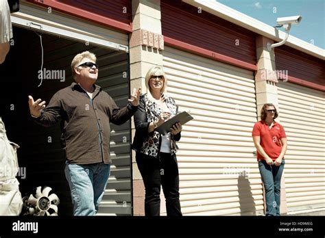 STORAGE WARS, (from left): auctioneers Dan Dotson, Laura Dotson, (Season 1), 2010-. photo: Emily ...